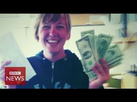 A Hidden Cash participant holding discovered banknotes in the BBC News video preview